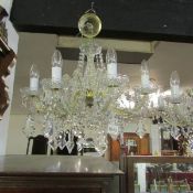 An 8 light glass chandelier