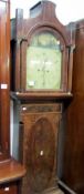 An early long case clock with harbour scene on face