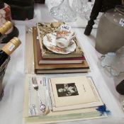 A mixed lot of commemorative items 1911-1937, books, postcards, 1902 cup and saucer etc