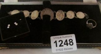 A pair of 9ct earrings, 9ct gold and silver ring and a George VI coin bracelet