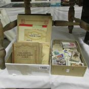 2 boxes of cigarette cards and albums