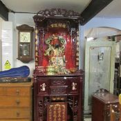 A Chinese lacquered cabinet with large figure etc