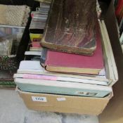 A box of books and magazines