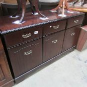 A mahogany effect sideboard