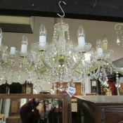 An 8 light glass chandelier