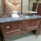 A inlaid washstand with marble top