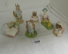 6 Beswick Beatrix potter figurines including The Old Woman, Peter Rabbit etc
