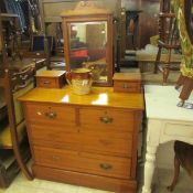 A satin walnut dressing table