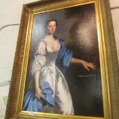 A gilt framed full portrait of a lady on canvas