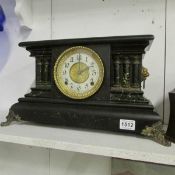 A Palladian style mantel clock