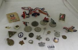 A good mixed lot of medals, badges, trench art ring etc