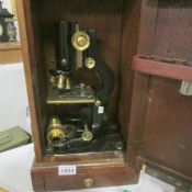 A Watson & Glover cased microscope
