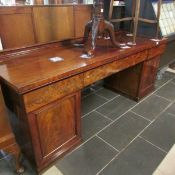 A Victorian mahogany double pedestal sideboard