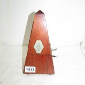 An Edwardian metronome in working order