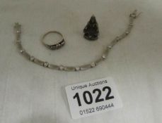 A brushed silver bracelet, marcasite ring and silver pendant