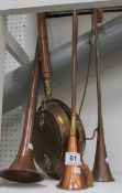 3 copper hunting horns and a bed warmer