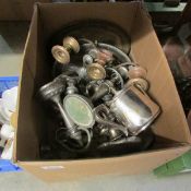 A box of metalware including candelabra