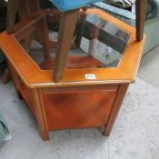 A glass topped coffee table