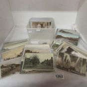 A box of approximately 200 postcards