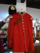 A blue cloth helmet with Dow Regiment drummers tunic & trousers