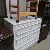 A white 3 drawer chest