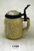 A Villery and boch 'Mettlach' stein with relief decoration, circa 1874-1909