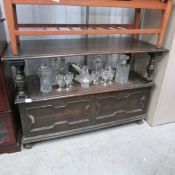 A metamorphic oak bench/hall table