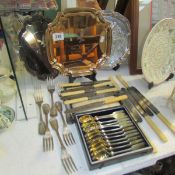 A mixed lot of cutlery and 3 silver plated trays