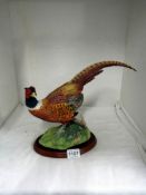 A large Border Fine Arts pheasant