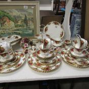 44 pieces of Royal Albert Old Country roses tea and dinner ware and 3 floral posies