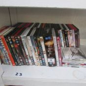 A mixed lot of DVD's and Cd's