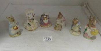 6 Royal Albert Beatrix Potter figurines including Lady Mouse made a curtsy, Hunca Munca Sweeping etc