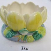 A Clarice Cliff bowl in the shape of a lily