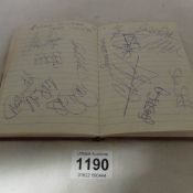 An autograph book of approximately 52 signatures including Lincoln 1990 football team, James Hunt,