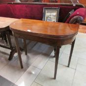 A mahogany fold over tea table