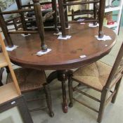 An Italian inlaid circular dining table