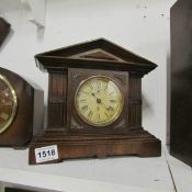 A mahogany mantel clock