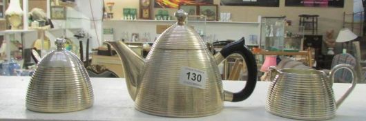 A Deco 3 piece metal tea set