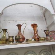 A mixed lot of brass and copper including vases, jugs etc