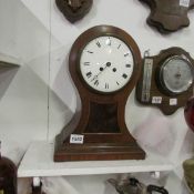 A Victorian mahogany mantel clock, missing glass and 1 hand