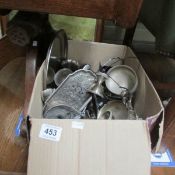 A box of metal ware