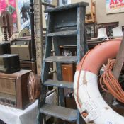 A wooden ladder and stepladder