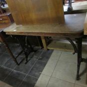 A hall table with cast iron base
