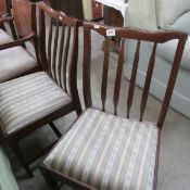 A pair of mahogany dining chairs
