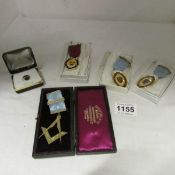 A quantity of Masonic medals and tie pin, including gold