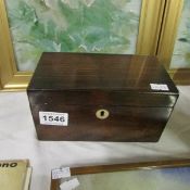 A rosewood tea caddy, missing 1 inner lid