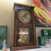 A wall clock with floral decoration