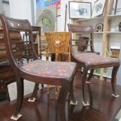 A pair of mahogany chairs