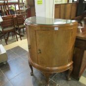 A domed front cabinet