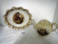 A Grimwade's Bairnsfather ware dish and a Grimwades teapot depicting WW1